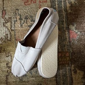 TOMS classic/ stone colored slip-on shoes. Women’s size 11. Mint condition.